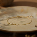 Exquisite floral diamond bracelet, minimalist flower design, available in gold or silver, adjustable (16+3 cm)