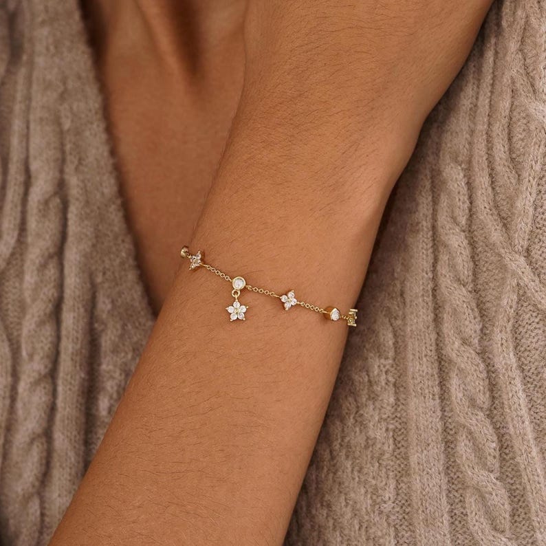 Gold-tone floral diamond bracelet, delicate adjustable flower bracelet for women, 16+3 cm