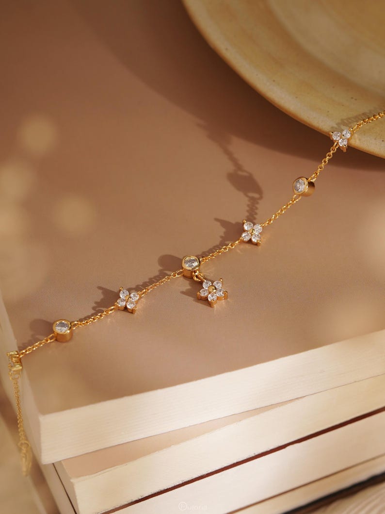 Gold-tone floral diamond bracelet, delicate adjustable flower bracelet for women, 16+3 cm