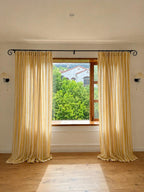 Yellow-striped linen-blend curtains (rod-pocket design with ruffles), light-filtering curtains