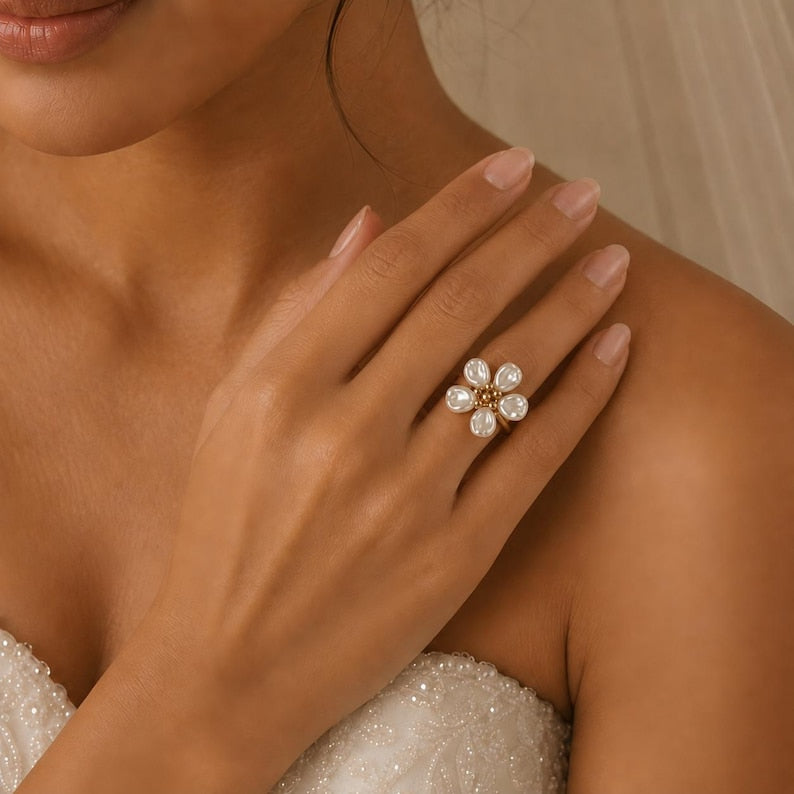 Gold-tone adjustable open ring, adorned with five faux Baroque pearl petals