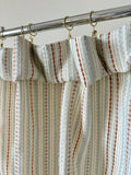 Blue-rust and cream striped knit curtains