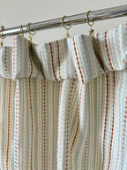 Blue-rust and cream striped knit curtains