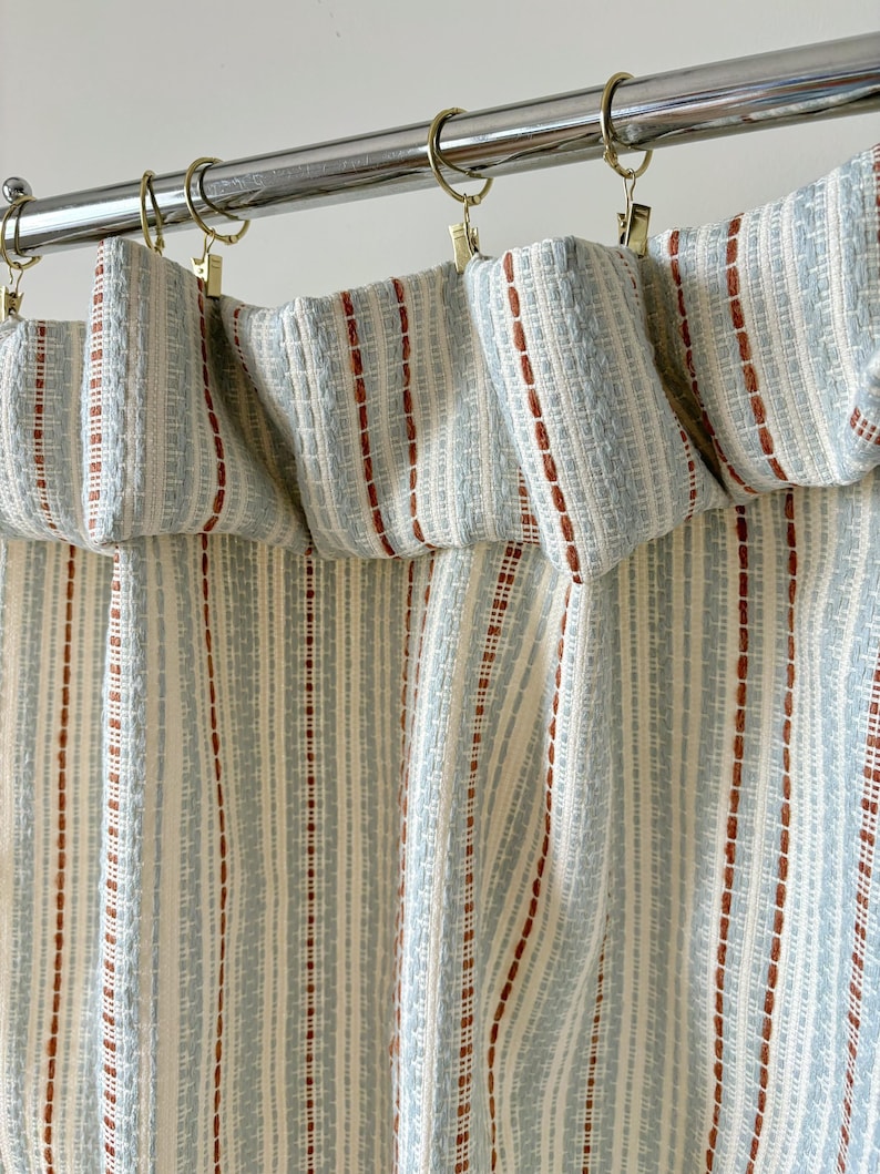 Blue-rust and cream striped knit curtains