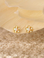 Floral opal stud earrings, available in 18K gold or 925 sterling silver, featuring white opals in a minimalist floral design